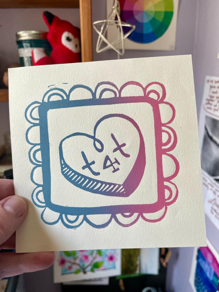 T4T | buy prints Linocut print of a conversation heart with the inscription "T4T". Printed in a baby blue and pink gradient.